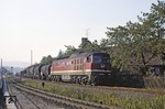 Auch längst Geschichte sind Güterzugeinsätze der Baureihe 232 (hier noch die unter DR-Bezeichung laufende 132 536) auf der Strecke Vienenburg - Halberstadt. Aufnahme bei der Einfahrt nach Wernigerode. Im Vordergrund die Schmalspurgleise der Harzquerbahn. (07.10.1991) <i>Foto: Will A. Reed</i>