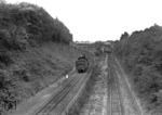 TEE 20 "Saphir" begegnet 38 3433 vom Bw Düren am Überwerfungsbauwerk zur Überleitung vom Linksfahrbetrieb aus Belgien aufs rechte Regelgleis der DB bei Aachen-Süd. (23.06.1962) <i>Foto: Walter Hollnagel</i>