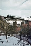 Über die Dächer von Wittlensweiler rollt 038 711 mit E 1949 aus Eutingen. (04.04.1973) <i>Foto: Wolfgang Bügel</i>