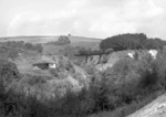 99 7204 mit einem GmP auf der Trienzbachbrücke bei  Krumbach. (08.1963) <i>Foto: Slg. Eisenbahnstiftung</i>