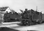 99 704 und 99 672 im Bahnhof Beilstein auf der Bottwartalbahn. (15.04.1964) <i>Foto: Slg. Eisenbahnstiftung</i>