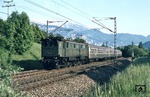 116 002 mit einem Eilzug von Kufstein nach München bei Oberaudorf. (07.1971) <i>Foto: Dieter Junker</i>