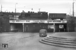 78 431 mit einem alten G 10-Güterwagen der DDR-Reichsbahn auf der Straßenunterführung Hüttenstraße zwischen Düsseldorf Hbf und -Oberbilk. (04.11.1957) <i>Foto: Helmut Säuberlich</i>