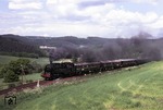 Im Mai 1981 veranstaltete die Schweizer Fa. Intraflug eine mehrtägige Reise mit dem Orient-Express durch die DDR, hier mit 95 0027-3 vor D 24407 auf der Strecke Rottenbach - Katzhütte. (28.05.1981) <i>Foto: Joachim Bügel</i>