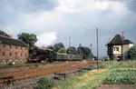 Vor dem aufziehenden Gewitter enteilt 03 2098 mit P 9536 dem Bahnhof Frose (bei Aschersleben). (10.06.1978) <i>Foto: Wolfgang Bügel</i>