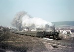 01 0523-9 befördert den beachtlichen D 207 (Frankfurt/M - Bebra - Gerstungen - Erfurt - Dresden - Görlitz - Warszawa) bei Ronshausen. (28.03.1973) <i>Foto: Wolfgang Bügel</i>
