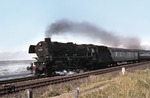 012 001-4 (01 1001) verlässt mit D 533 (Köln - Westerland) den Hindenburgdamm und erreicht bei Morsum die Insel Sylt. (24.06.1972) <i>Foto: Peter Schiffer</i>