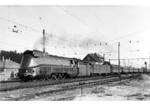 03 1090 in Stromlinienverkleidung verlässt vor D 121 den Bahnhof Attnang-Puchheim. (04.06.1942) <i>Foto: DLA Darmstadt</i>
