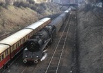 03 0010-3 (03 1010) begegnet vor D 814 einem S-Bahnzug in Berlin-Schönhauser Allee. (04.04.1979) <i>Foto: Peter Schiffer</i>