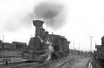 Die 1860 bei StEG gebaute Lok 680 war zunächst bei der österreichischen Südbahn im Einsatz, von 1925 bis 1964 bei der Graz-Köflacher-Eisenbahn. Im Rahmen der Wiederaufführung von Buster Keatons Stummfilm "Der General" aus dem Jahre 1926 erreicht sie auf Werbetour den Bahnhof Hamburg-Harburg. (15.02.1962) <i>Foto: Walter Hollnagel</i>