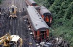 Am Abend des 26.Mai 1983 entgleiste auf der Strecke Aachen - Köln im Bahnhof Groß-Königsdorf der D 225 (Ostende-Wien), bei dem sechs Menschen getötet und 23 schwer verletzt wurden. Nach  starke Regenfällen waren Teile des Hanges im Einschnitt des ehemaligen Königsdorfer Tunnels aufgeweicht und auf die Trasse abgerutscht. Die Zuglok 110 477 und drei Wagen sprangen aus den Gleisen . Die entgleiste Lok wurde in der westlichen Bahnhofseinfahrt durch eine Weiche nach rechts abgelenkt und prallte gegen einen massiven Brückenpfeiler der Straßenüberführung Augustinusstraße. Als Ersatz für die verunglückte 110 477 wurde 1985 Lok 139 134 in die neu vergebene 110 511 umgebaut.  (28.05.1983) <i>Foto: Peter Schiffer</i>