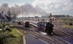 Blick vom Emder Zentralstellwerk auf die ausfahrende 012 100-4 (01 1100) vor dem "bunten" D 1337. (31.08.1973) <i>Foto: Wolfgang Bügel</i>