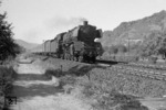 03 245 vom Bw Köln-Deutzerfeld vor einem Eilzug auf der rechten Rheinstrecke bei Oberlahnstein. (Datum unbekannt) <i>Foto: A.E.Durrant</i>