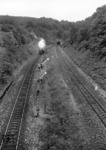 Der in den Jahren 1838 bis 1843 erbaute 691 m lange Buschtunnel an der Strecke Aachen - Lüttich war bis zum Neubau einer zweiten Tunnelröhre im Jahre 2007 der älteste noch befahrene Eisenbahntunnel Deutschlands. Hier passiert eine Lok der Baureihe 50 die Überleitstelle unmittelbar vor dem Tunnel. (23.06.1962) <i>Foto: Walter Hollnagel</i>