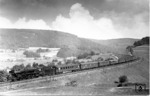 Die aus der ehemaligen 02 004 (RAW Meiningen, Abnahme-Datum 15.11.1942) umgebaute 01 241 rollt vor D 503 bei Hain im Spessart talwärts. (24.09.1949) <i>Foto: Carl Bellingrodt</i>