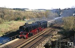 41 360 überquert mit Sonderzug E 25038 nach Köln die Kyllbrücke in der Einfahrt zum Bahnhof Jünkerath. (24.04.1988) <i>Foto: Joachim Bügel</i>