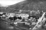 56 2127 hat soeben den 4205 m langen Kaiser-Wilhelm-Tunnel verlassen und rollt in den Bahnhof Cochem an der Mosel ein. (20.08.1930) <i>Foto: DLA Darmstadt</i>