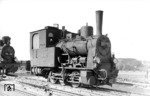 99 303 (Bw Rostock) im Bahnhof Bad Doberan. Die abgestellte Reservelok wurde für Carl Bellingrodt extra aus dem Lokschuppen gezogen. Die Großherzoglich Mecklenburgische Friedrich-Franz-Eisenbahn (MFFE) ließ die Lok 1914 als Gattung T 7 von der Fa. Henschel in Cassel bauen.  (04.07.1933) <i>Foto: DLA Darmstadt (Bellingrodt)</i>