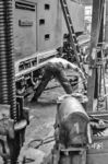 Triebwerksarbeiten an einer "Altbau-VIIK" der Baureihe 99.73-76 (eventuell 99 1760) im Raw Görlitz. (30.07.1985) <i>Foto: Heiko Kußmann</i>