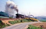 50 696 vom Bw Aachen West erklimmt unter Zuhilfenahme einer Schiebelok mit einem Ganzzug (Gdg) die Kohlscheider Rampe südlich von Herzogenrath. (05.1968) <i>Foto: Robin Fell</i>