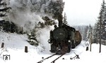 99 1778 mit einem Güterzug auf der Schmalspurbahn Cranzahl - Oberwiesenthal bei Kretscham-Rothensehma. (10.04.1977) <i>Foto: Joachim Bügel</i>