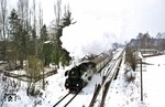 Selbst in die Oberlausitz hatte es der Schnee zu Ostern geschafft. So fährt 03 2265 mit P 3807 (Dresden - Görlitz) bei winterlichen Verhältnissen aus Großharthau. (11.04.1977) <i>Foto: Joachim Bügel</i>