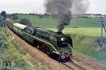 Sonderzug P 27740 räuchert mit 02 0201 durch den Vorharz nahe Hergisdorf (bei Eilsleben). Hinter der Lok ist ein Meßwagen der VES-M Halle eingestellt. (14.05.1977) <i>Foto: Wolfgang Bügel</i>