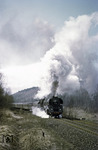 01 526 (Bw Erfurt) kämpft sich mit D 199 die Steigung bei Hönebach hinauf. (27.03.1970) <i>Foto: Robin Fell</i>
