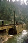 Durch das wildromatische Tal der Roten Weißeritz fährt 99 1789 mit P 14265 nach Kipsdorf. (31.03.1978) <i>Foto: Wolfgang Bügel</i>