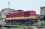 Die DR V 100 015 (Hersteller LEW) wurde am 24.02.1967 in Dienst gestellt. Am 01. Juni 1970 wurde sie in "110 015-5" umgezeichnet, ab 01.01.1992 erhielt sie die Betriebsnummer "201 015-5". Am 28.02.1995 wurde sie beim Bh Lutherstadt-Wittenberg ausgemustert. Die Aufnahme entstand im Bw Halle-P. (1968) <i>Foto: Robin Fell</i>