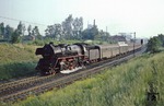 41 1144 mit P 9409 (Oebisfelde ab 4.49 Uhr - Stendal - Magdeburg) bei Zielitz. (01.06.1979) <i>Foto: Joachim Bügel</i>
