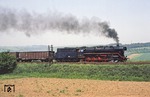 44 0338 mit einem Güterzug am Bahnübergang der Fernstraße 86 zwischen Sangerhausen und Riestedt. (01.06.1979) <i>Foto: Joachim Bügel</i>