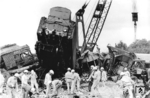 Am 27. Juni 1977 wurde durch das Versehen eines Weichenwärters im Bahnhof Booßen auf der Bahnstrecke Eberswalde–Frankfurt (Oder) ein Zug auf die falsche Strecke geleitet. In der Folge stießen der Urlauberschnellzug D 1918, gezogen von der Stralsunder 03 0078 und Dg 50101 mit 132 200, der von Kietz in Richtung Booßen unterwegs war, frontal zusammen. 31 Menschen starben, 7 Reisende wurden schwer und zahlreiche weitere leicht verletzt. (27.06.1977) <i>Foto: ADN, Slg. Erich Preuß</i>
