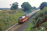 DR 119 026 mit D 446 (Leipzig - Köln) zwischen Wegenstedt und Oebisfelde bei Etingen. (13.08.1982) <i>Foto: Joachim Bügel</i>