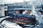 01 519 (ex 01 186) wurde am 02.10.1982 beim Bw Saalfeld ausgemustert. Nach ihrer Ausmusterung wurde sie zusammen mit 01 510, 01 513 und 01 517 zu Heizzwecken an die VEB Brauerei Greifswald abgegeben (vgl. Bild-Nrn. 18180 und 18181). Die Loks wurden hierfür Ende Oktober 1982 von Gerstungen nach Stralsund überführt und im Bf. Hornstorf (bei Wismar) im November 1982 auf Kohlefeuerung umgebaut. In Greifswald waren sie als stationäre Heizanlagen für die Brauerei, das Krankenhaus und weitere, umliegende Betriebe im Einsatz. Dieser Einsatz endete im Oktober 1988 mit der inbetriebnahme einer neuen Heizanlage. Im Sommer 1989 wurde dann mit der Verschrottung der Lokomotiven durch die DR begonnen. Buchstäblich in letzter Sekunde konnte 01 519 als letzte der vier vor dem Schneidbrenner gerettet werden. Der Grund für die Rettung war ein Kompensationsgeschäft zwischen dem Lichtensteiner Touristikunternehmen Jelka und der DR für den Einsatz eines Triebwagens VT 611 als IC zwischen Hamburg und Berlin. Die Lok wurde in einem erbärmlichen Zustand im September 1990 dem Raw Meiningen zugeführt und dort wiederaufgearbeitet. Diese Hauptuntersuchung kam beinahe einem Neubau gleich. Der Tenderaufbau, das Führerhaus, einige Lager, sowie die Kessel- und Zylinderverkleidungen mußten neu hergestellt werden. Hier macht die Lok nach neun Jahren Abstellzeit ihre ersten Gehversuche im RAW Meiningen. (21.12.1990) <i>Foto: Manfred Kantel</i>