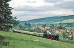 Bei Dietzhausen ist 042 271 mit D 554 unterwegs. Der erste Wagen hinter der Lok dürfte an diesem Tag wohl am besten ausgelastete gewesen sein. (15.06.1991) <i>Foto: Manfred Kantel</i>