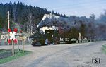 99 1568 räuchert auf der Schmalspurbahn Wolkenstein - Jöhstadt mit Ng 66512 durch Niederschmiedeberg. (21.04.1983) <i>Foto: Wolfgang Bügel</i>