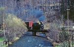 In der Einfahrt nach Niederschmiedeberg überquert 99 1568 mit Ng 66512 die Preßnitz. (21.04.1983) <i>Foto: Wolfgang Bügel</i>
