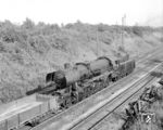 52 7136 wurde im August 1943 an die RBD Halle geliefert und ist hier bei Stralsund unterwegs. Offenkundig erhielt sie bei einem RAW-Aufenthalt einen Einheitstender der Baureihe 50 verpasst. (04.07.1968) <i>Foto: Will A. Reed</i>