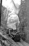99 5092 mit P 14454 nach Harzgerode im Wald bei Alexisbad. (12.04.1976) <i>Foto: Joachim Bügel</i>