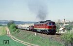 DR 132 109 mit einem Güterzug bei Neue Schenke auf der Bahnstrecke Göschwitz - Gera. (25.04.1983) <i>Foto: Wolfgang Bügel</i>