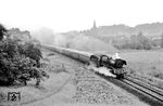 Im strömenden Regen ist 03 0090 (03 1090 vom Bw Stralsund) mit D 555 (Barth - Erfurt) bei Burg Stargard unterwegs. (10.09.1978) <i>Foto: Joachim Bügel</i>