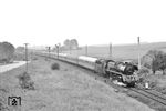 Der aus Wagen der MAV und DR gebildete D 270 "Meridian" (Bar - Budapest - Bratislava - Prag - Dresden - Berlin - Sassnitz - Trelleborg - Malmö C) fährt mit 03 0085 durch das mecklenburgische Cammin. (14.09.1978) <i>Foto: Joachim Bügel</i>