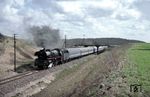 03 0085 (03 1085) vor dem aus ungarischen Wagen gebildeten D 270 "Meridian" bei Lietzow auf Rügen.  (30.04.1979) <i>Foto: Wolfgang Bügel</i>