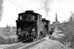91 1941 und 91 1940 vor der Stadtkulisse von Rostock auf der Verbindungsbahn vom Stadthafen zum Hauptbahnhof. (04.1938) <i>Foto: Karl Eschenburg</i>