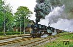 50 3556 und 50 3520 (beide vom Bw Halberstadt) kacheln mit Ng 66704 aus dem Bahnhof Ditfurt. (10.05.1986) <i>Foto: Slg. Wolfgang Bügel</i>