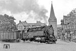 99 7222 (BMAG, Baujahr 1931) überquert den Bü der Fernstraße 244 am Westerntorturm in Wernigerode. (1977) <i>Foto: Karsten Risch</i>