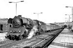 03 1058 steht vor einem Schnellzug nach Berlin abfahrbereit im Stralsunder Hauptbahnhof. (09.1969) <i>Foto: Robin Fell</i>