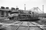 Auf der Drehscheibe am "Schuppen I" an der "Berliner Brücke" stellt sich 02 0314-1 im Heimat-Bw Halle (Saale) P dem Fotografen. Die einst badische IVh 18 314 war 1919 bei der Bwst Offenburg in Dienst gestellt worden und kam 1948 im Tausch gegen 18 434 in die damalige Sowjet-Zone. Ab 1951 stand sie als Bremslok der VES-M Halle (Saale) zur Verfügung. Seit der "Rekonstruktion" 1960 im Raw Zwickau (Sachs) zählte die elegante Dame zu den Edelrennern der VES-M. Doch 1971 bestand kein Bedarf mehr an der Maschine, sie wurde abgestellt und am 01.08.1972 dem Verkehrsmuseum Dresden übereignet. Heute ist sie im Technikmuseum Sinsheim zu bewundern. (18.09.1971) <i>Foto: Robin Fell</i>
