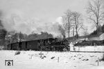 99 1594 mit einem Personenzug nach Jöhstadt bei Großrückerswalde. (29.03.1975) <i>Foto: Joachim Schmidt</i>